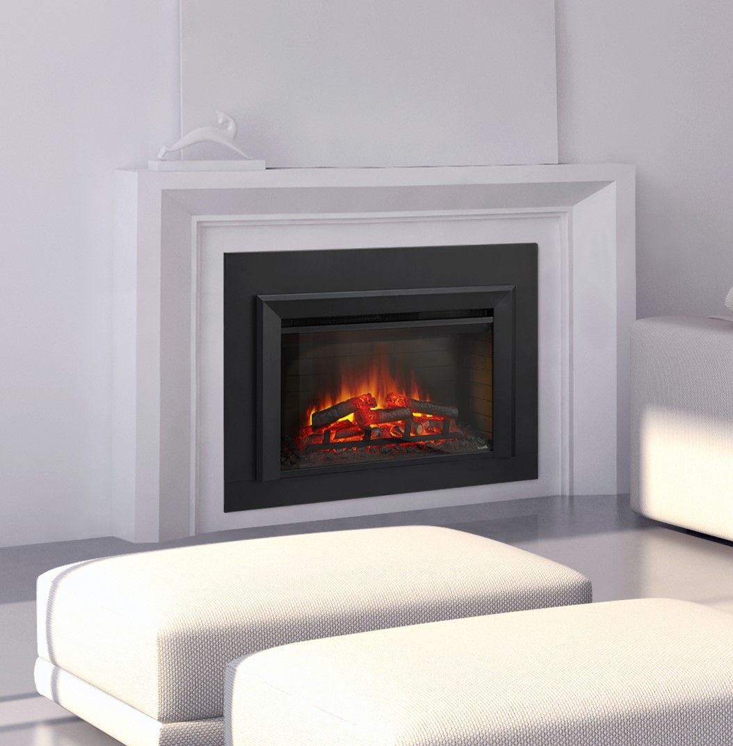 A living room with a fireplace and two ottomans.