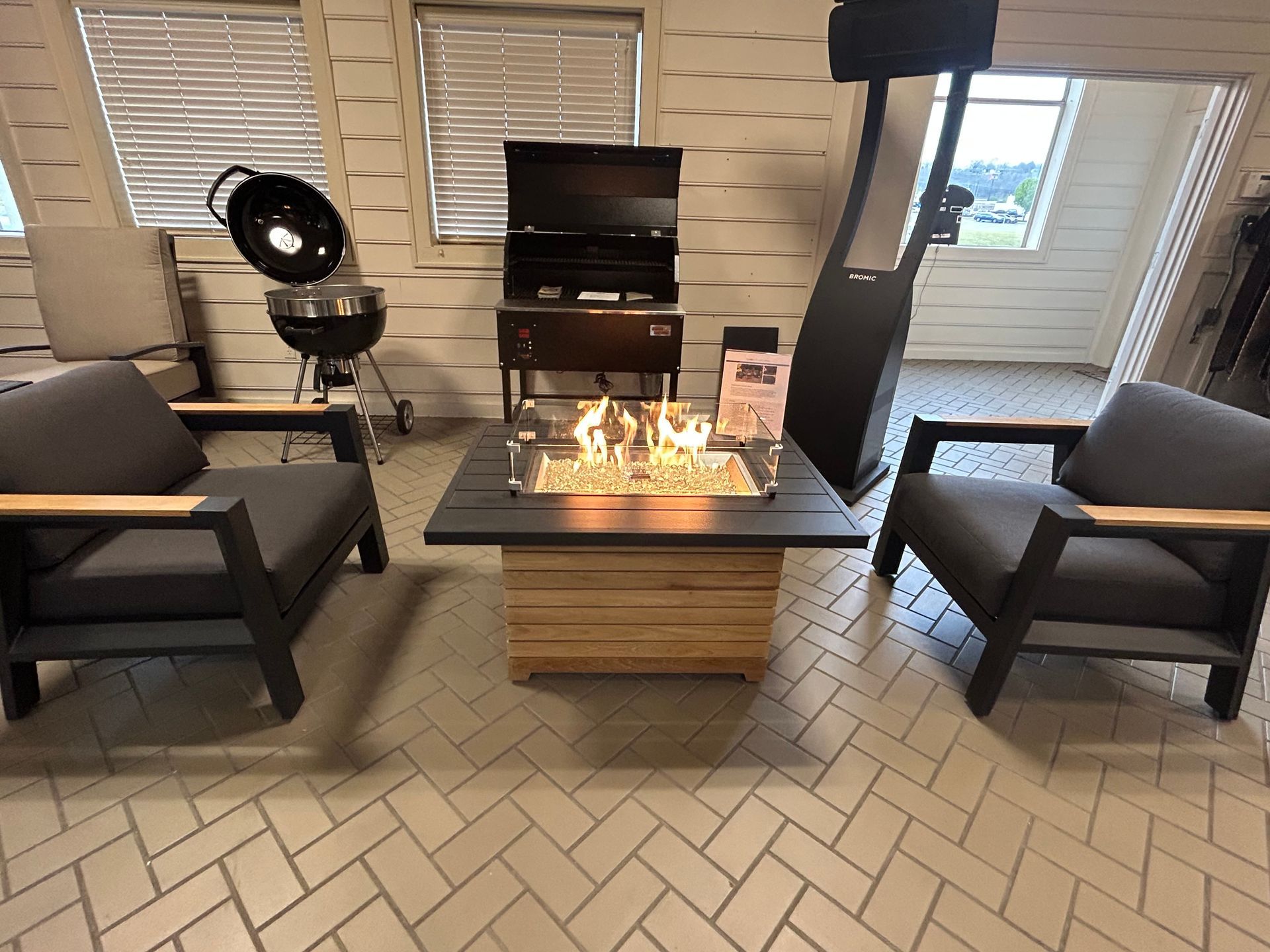 There is a fire pit in the middle of the room.