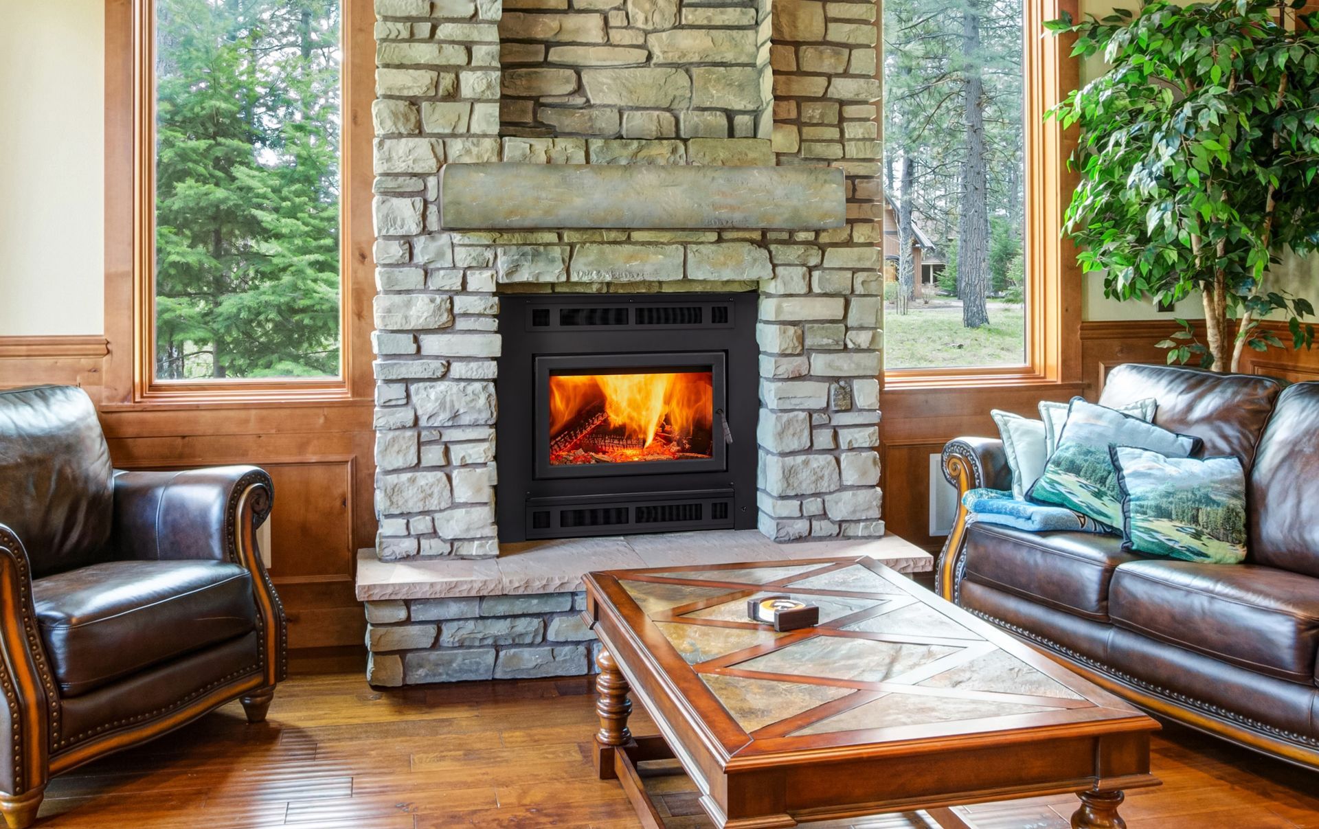 A living room with a fireplace , couch , chair and coffee table.