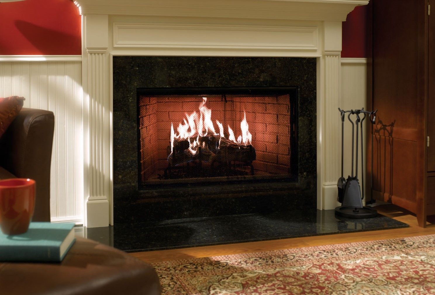 A living room with a fireplace and a couch