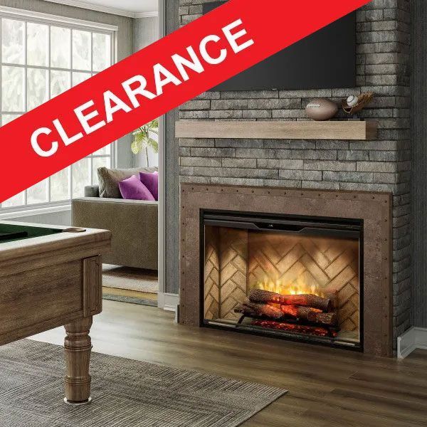 A living room with a pool table and a fireplace