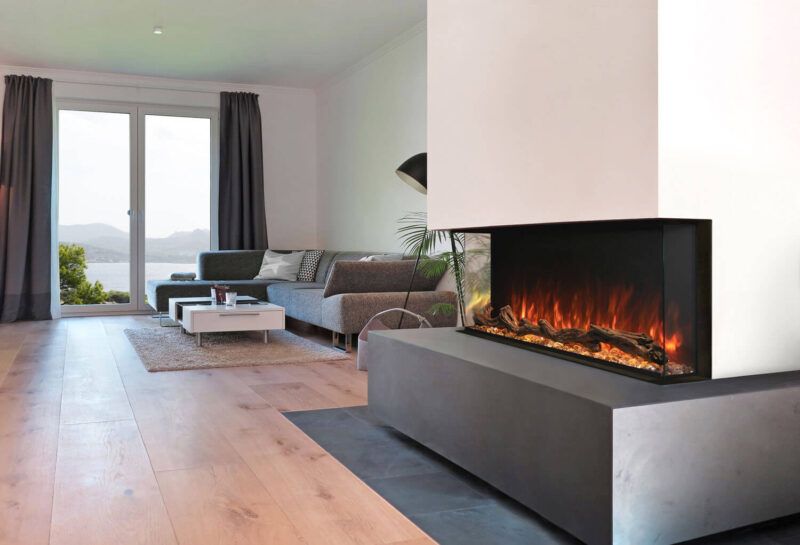 A living room with a fireplace and a couch.