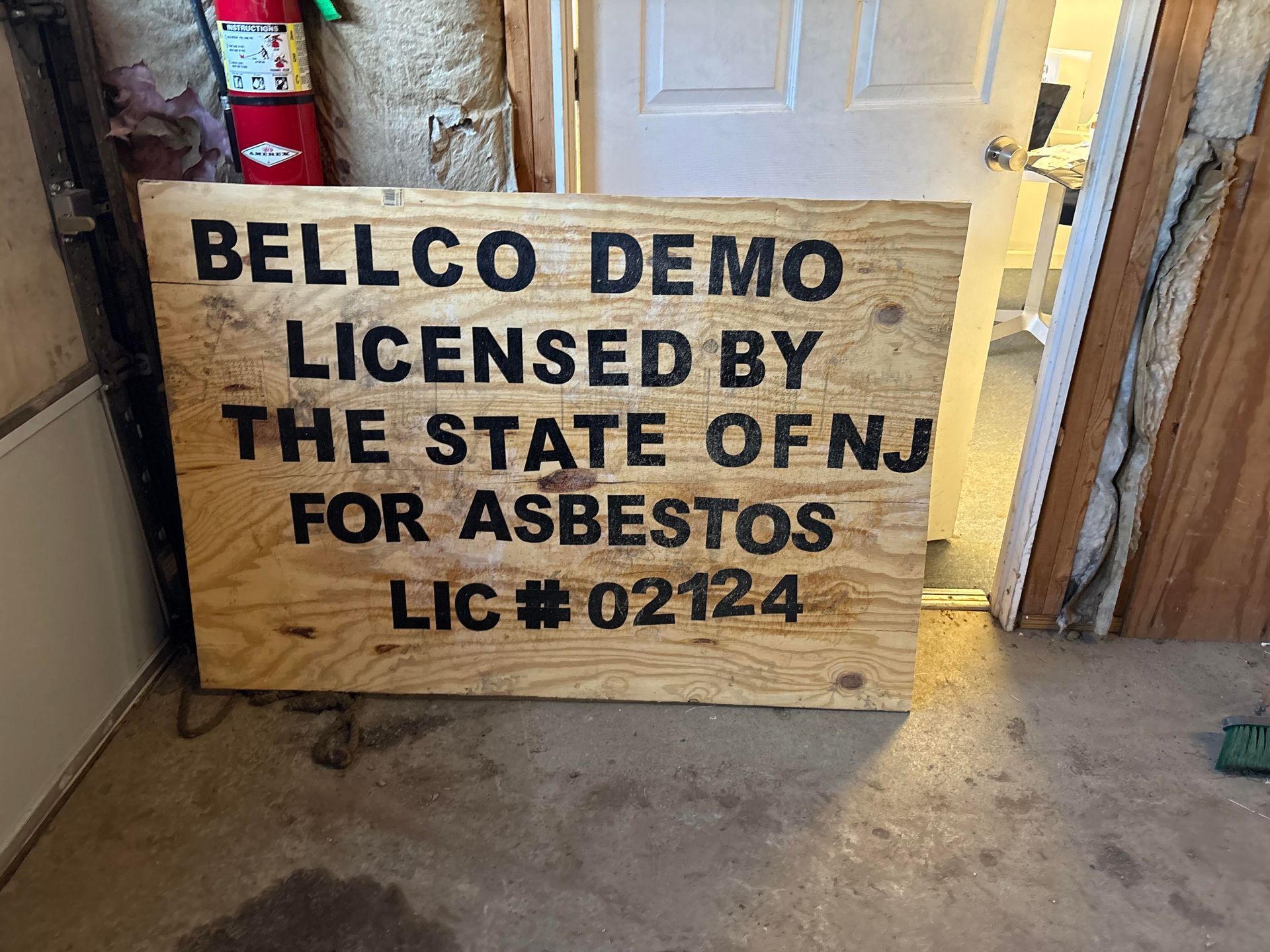 Wooden asbestos warning sign