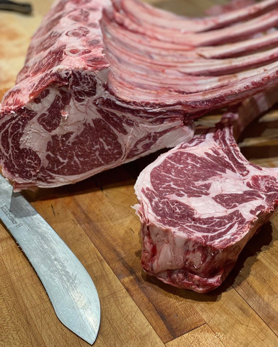 Raw tomahawk on a wooden surface