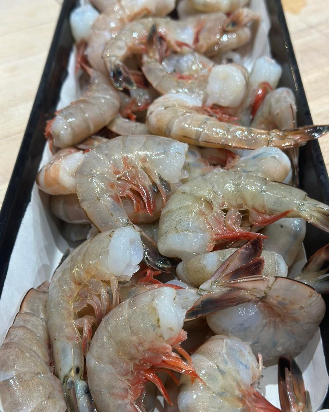 Raw shrimp on a platter