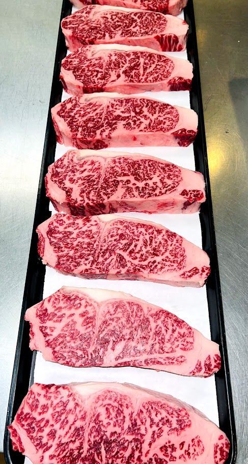 Black wagyu NY strips