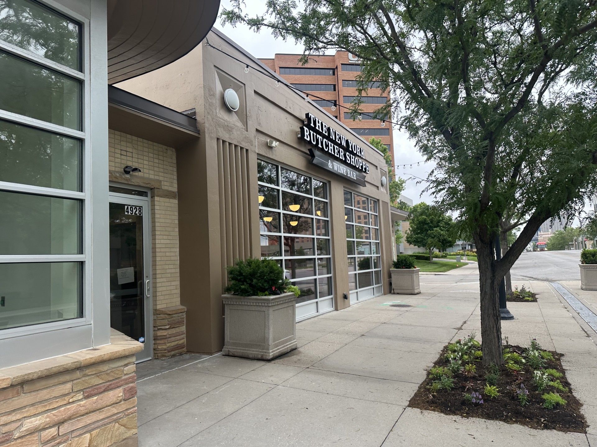 Side view of New York Butcher Shoppe's storefront
