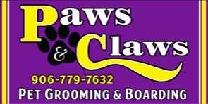 Paws & Claws Pet Grooming and Boarding logo