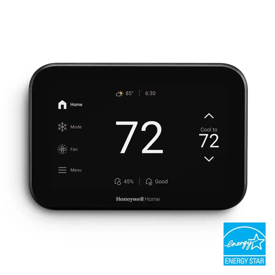 Black Honeywell smart thermostat displaying 72 degrees.
