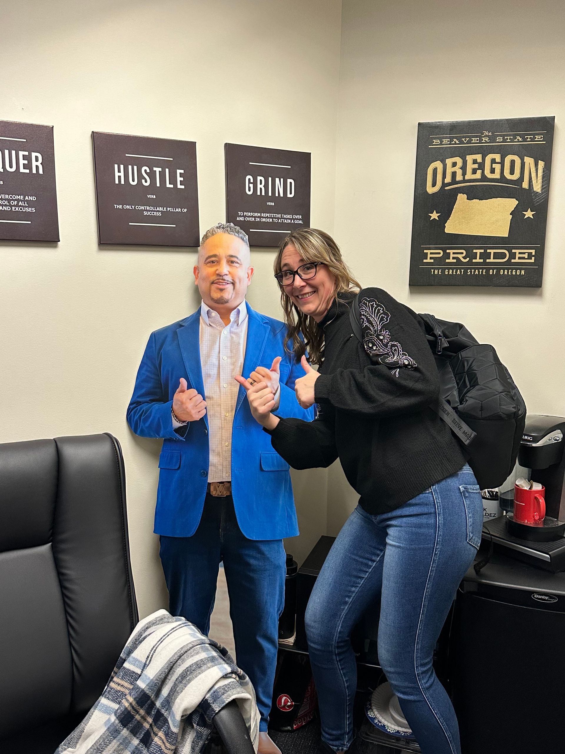 Posing for a picture in an office