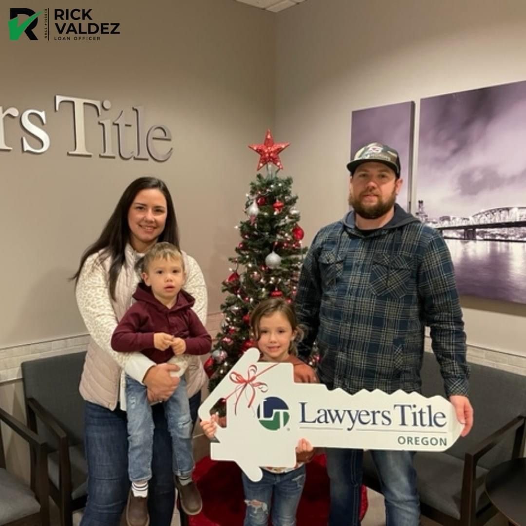 Family with a big house key