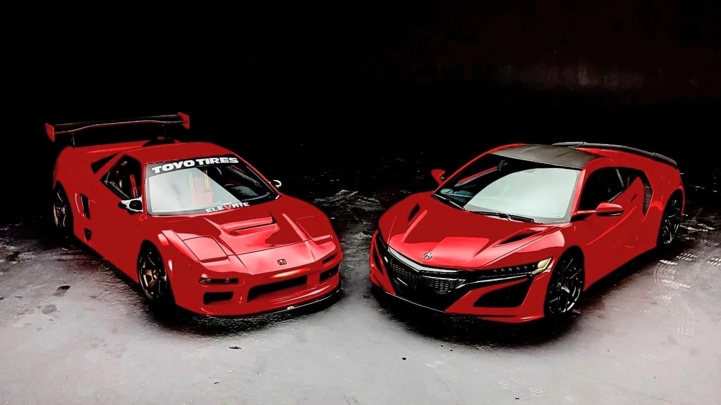 Two red sports cars parked side by side on a dark floor, shown in a studio-like setting