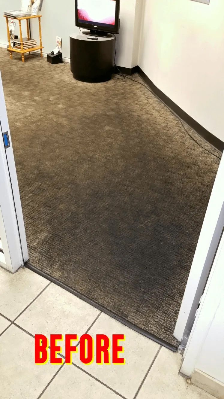 A before picture of a carpeted floor in a room