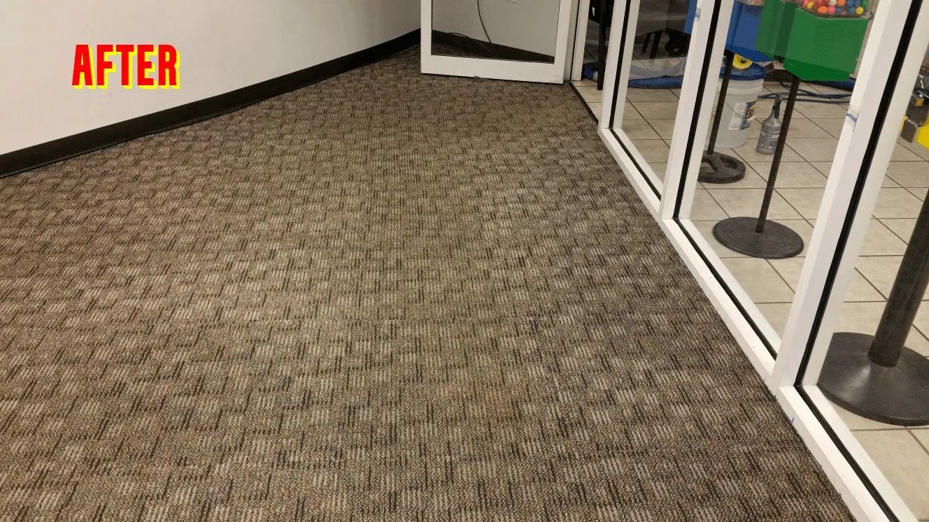 A picture of a carpeted floor in a room