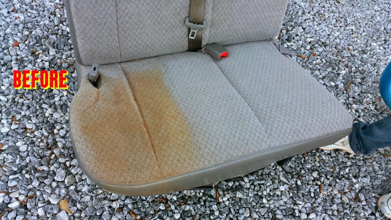 A picture of a car seat before being cleaned