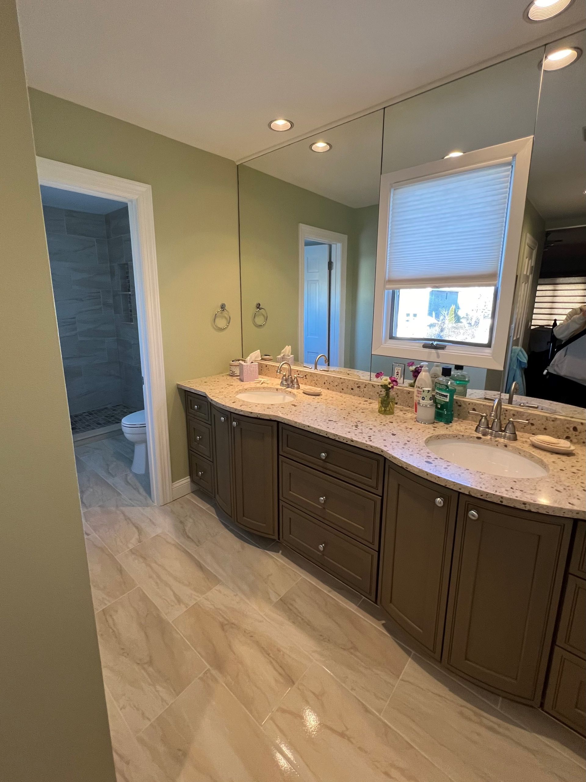 A bathroom with double sinks