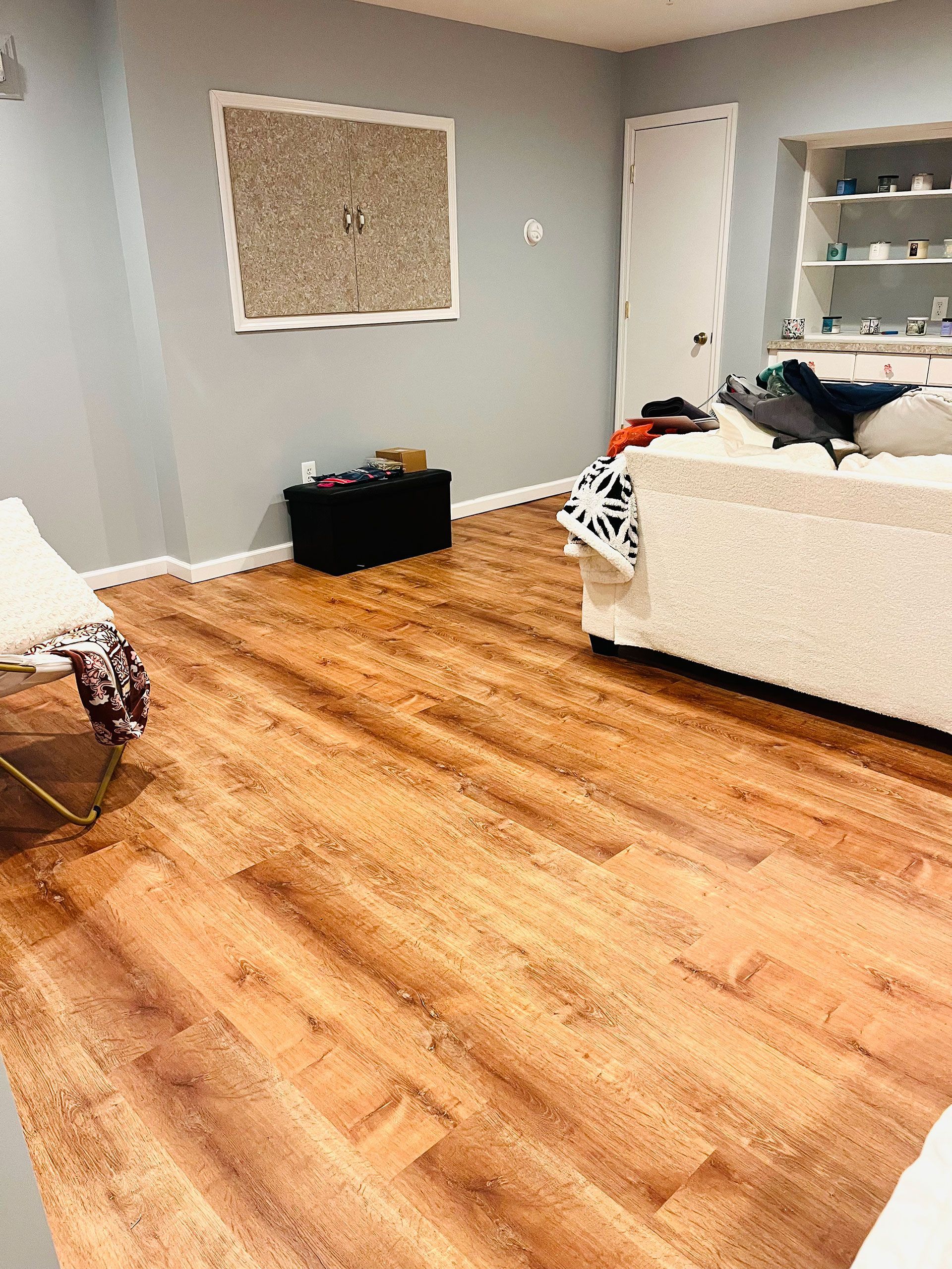 A living room with hardwood flooring