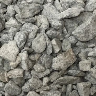 A pile of rocks is sitting on a table.