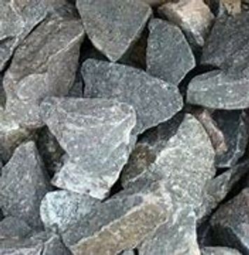 A pile of rocks sitting on top of each other on a table.