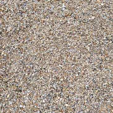A pile of small, beige, and gray pebbles