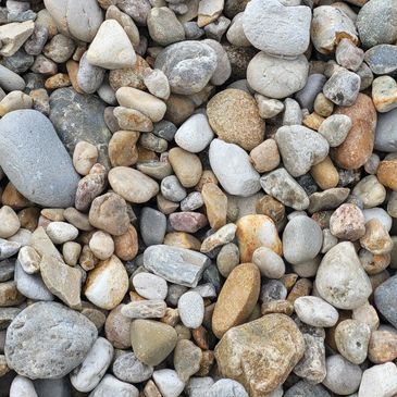There are many different types of rocks in this pile.