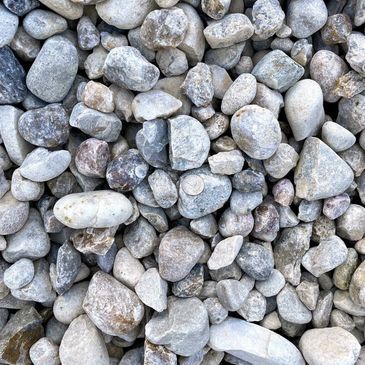 A pile of rocks of different sizes and colors.