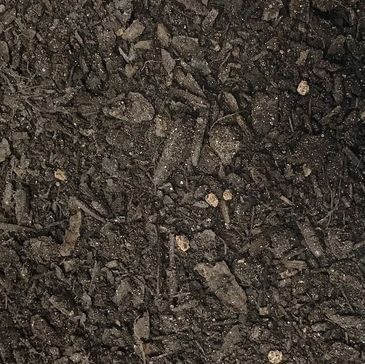 A close up of a pile of dirt and rocks.