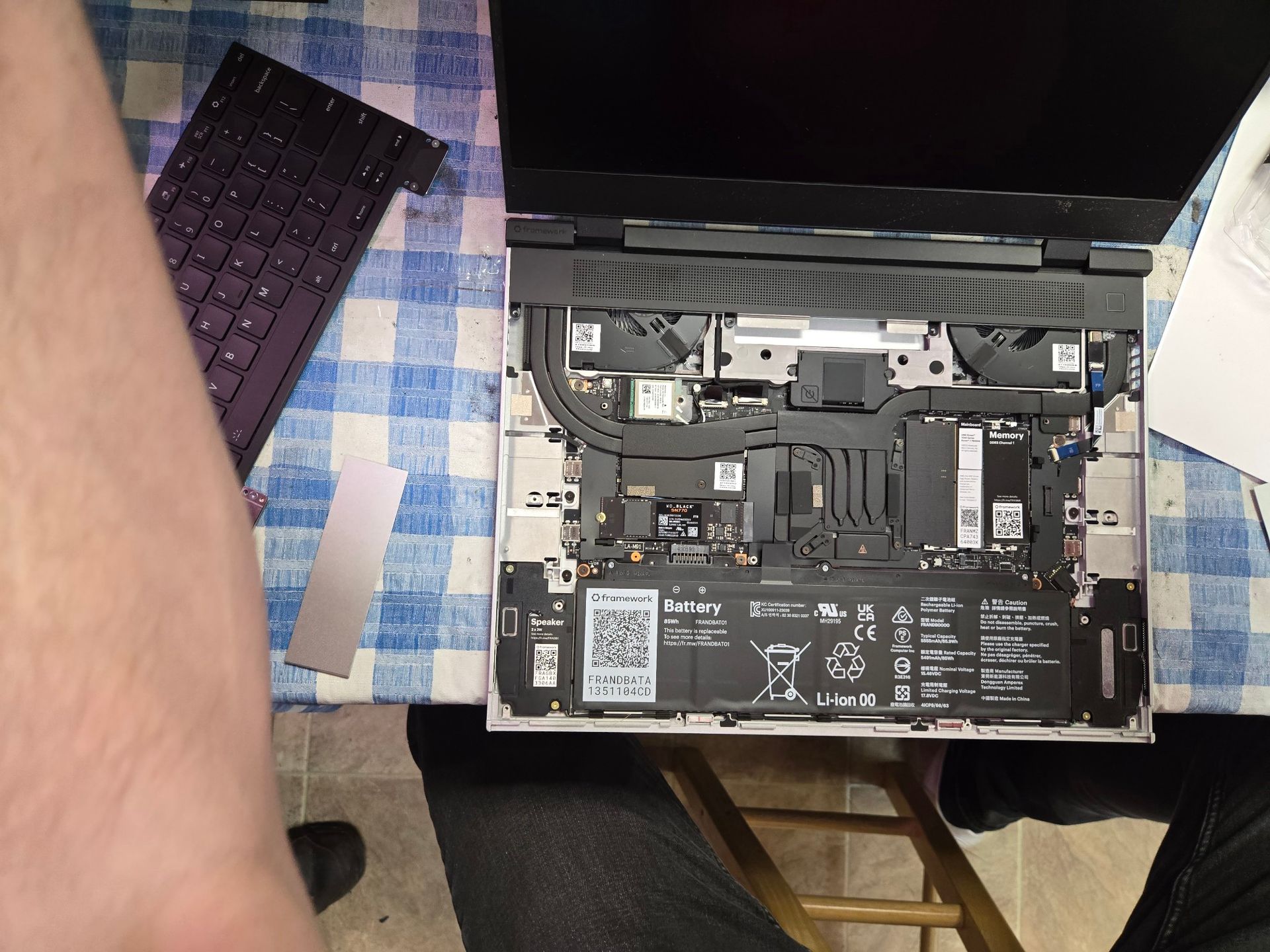 The inside of a laptop is shown with the battery removed.