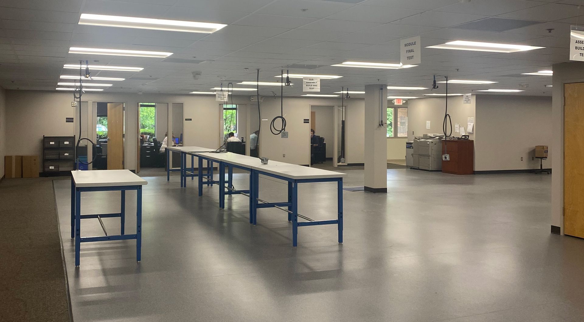 a large room with a lot of tables in it