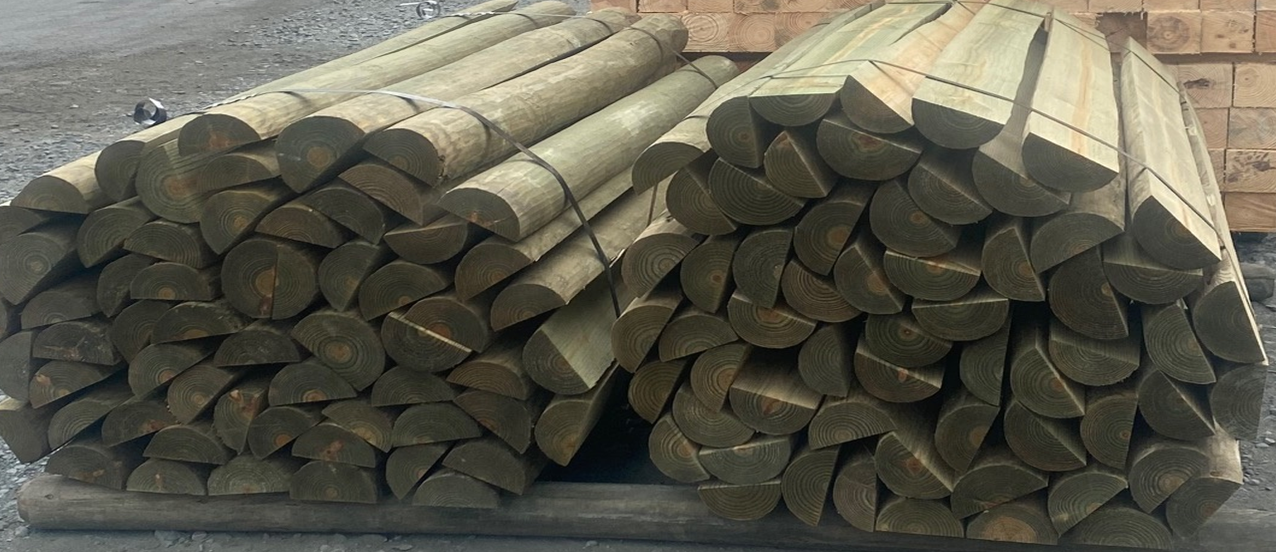 Two piles of logs are stacked on top of each other