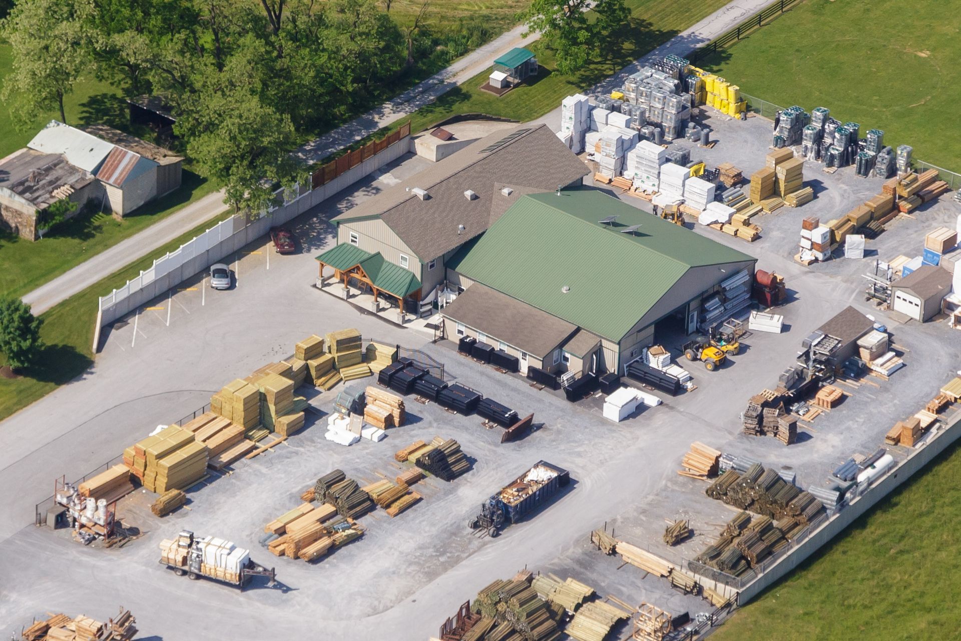 An aerial view of a building with a green roof