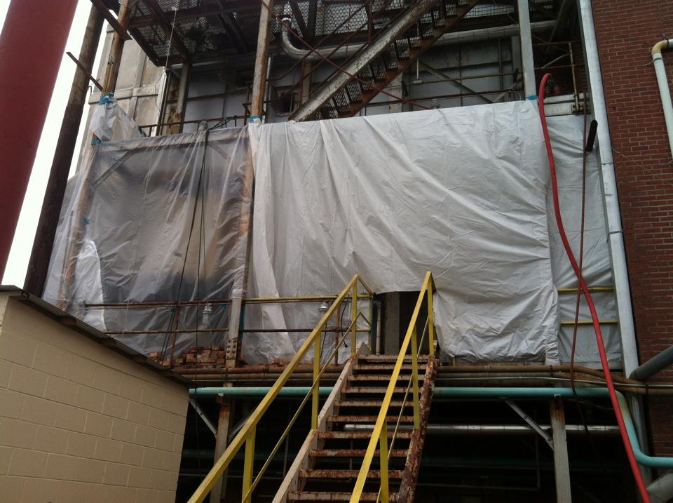 Removing hazardous boiler insulation