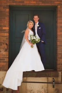 Bride and Groom near the door