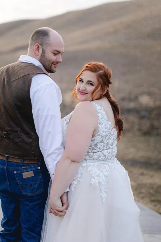 Bride and Groom holding hands