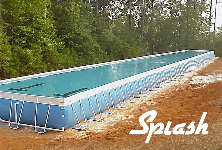 A large swimming pool with the word splash on the bottom