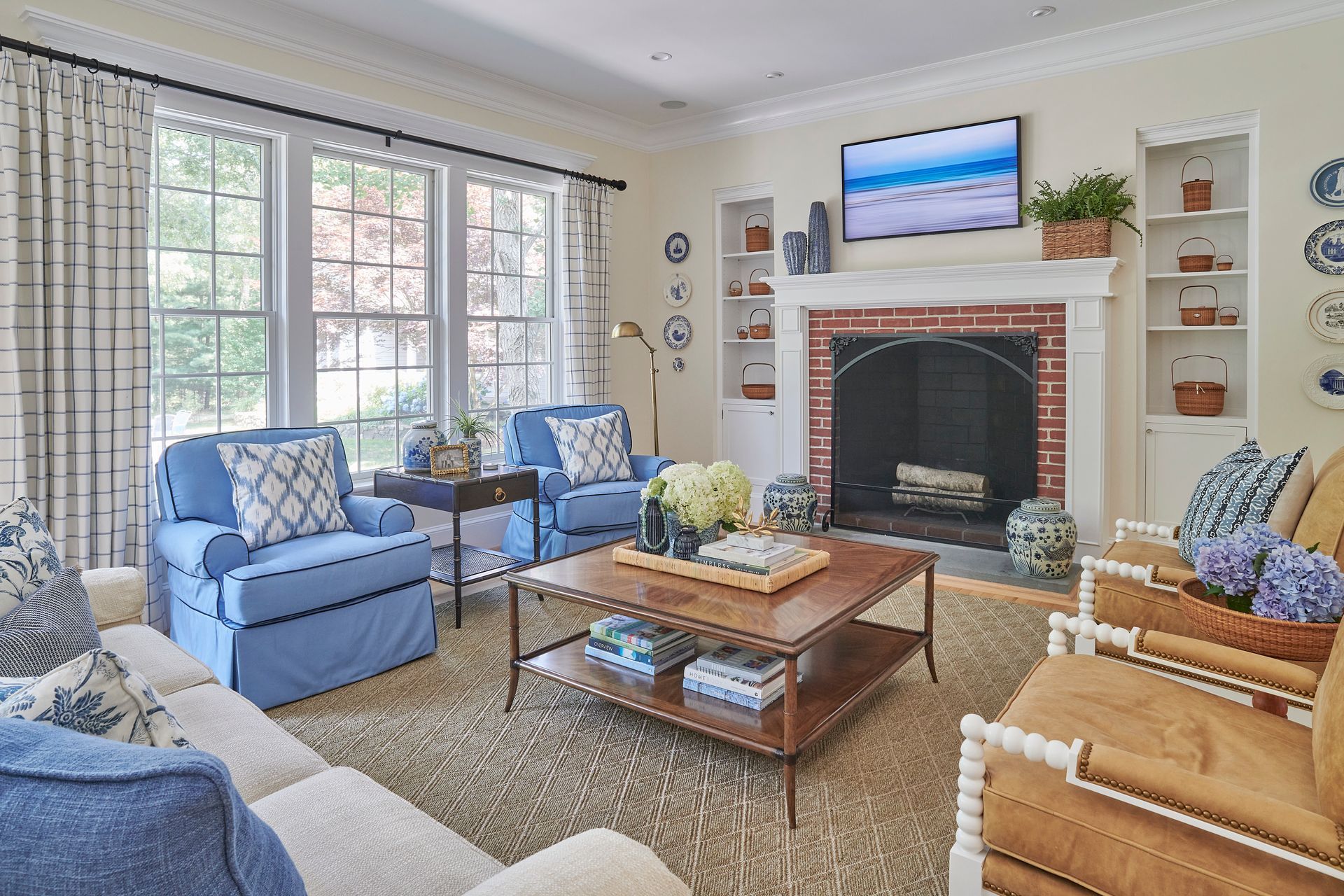 Living room with blue and brown colored chairs