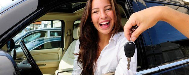 happy women with car key