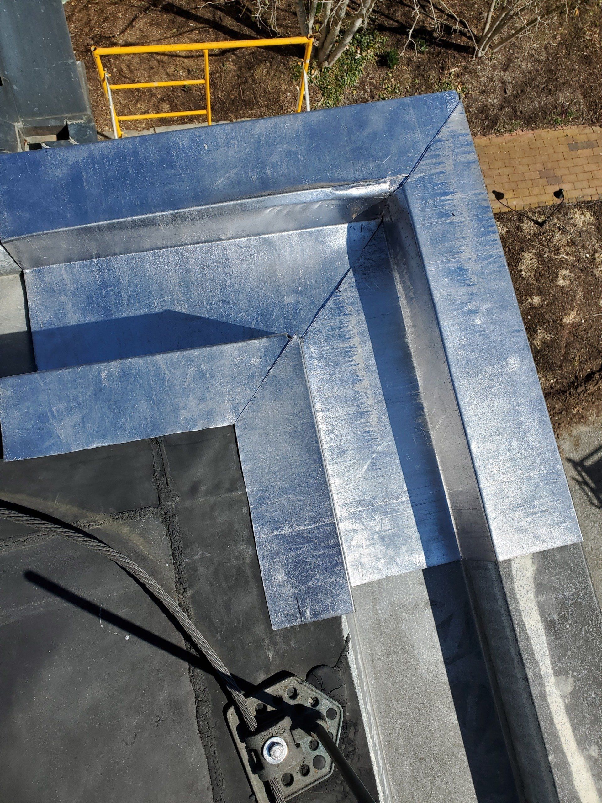 Metal patch on a damaged roof