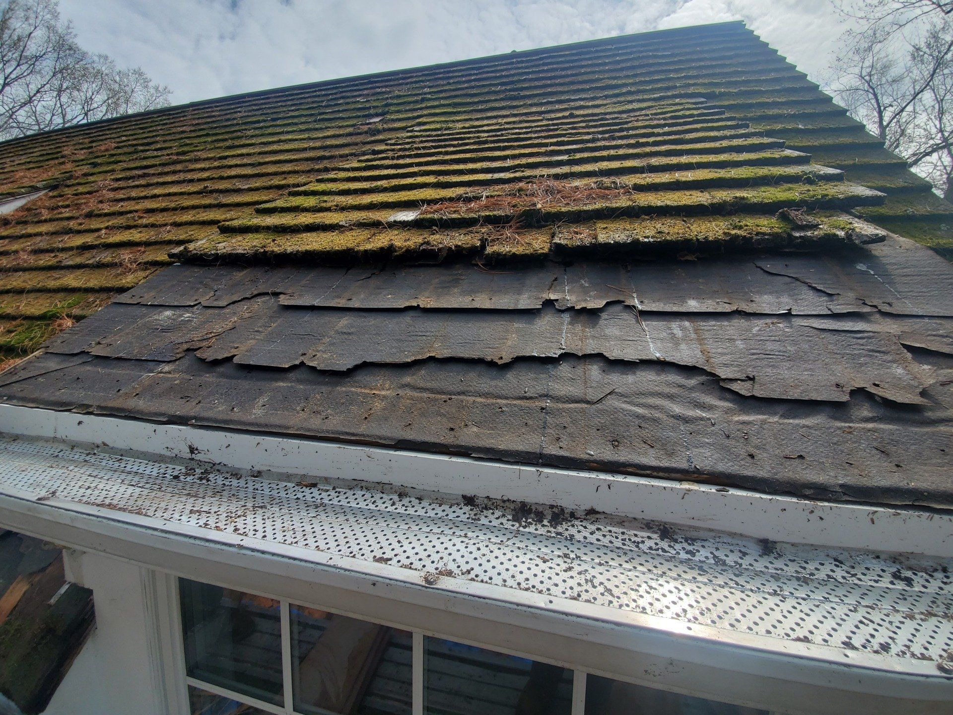 Damaged shingles roofing