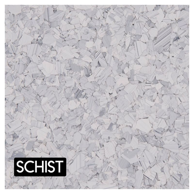 A close up of a white carpet with the word schist on it