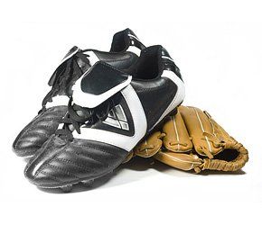 Baseball cleats and a glove