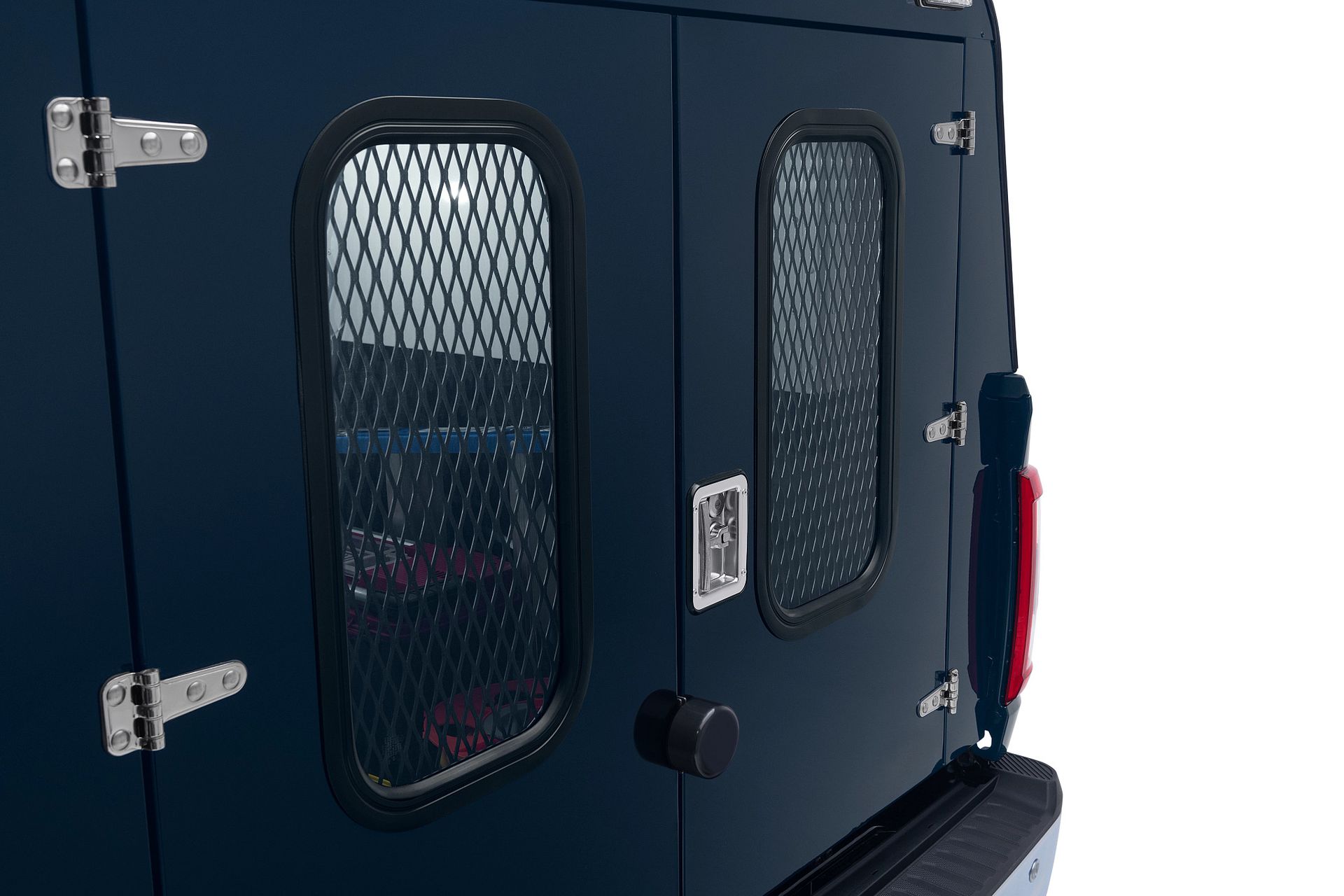 Close-up of dark blue van back doors with two vertical windows protected by black metal security grates and chrome hinges.
