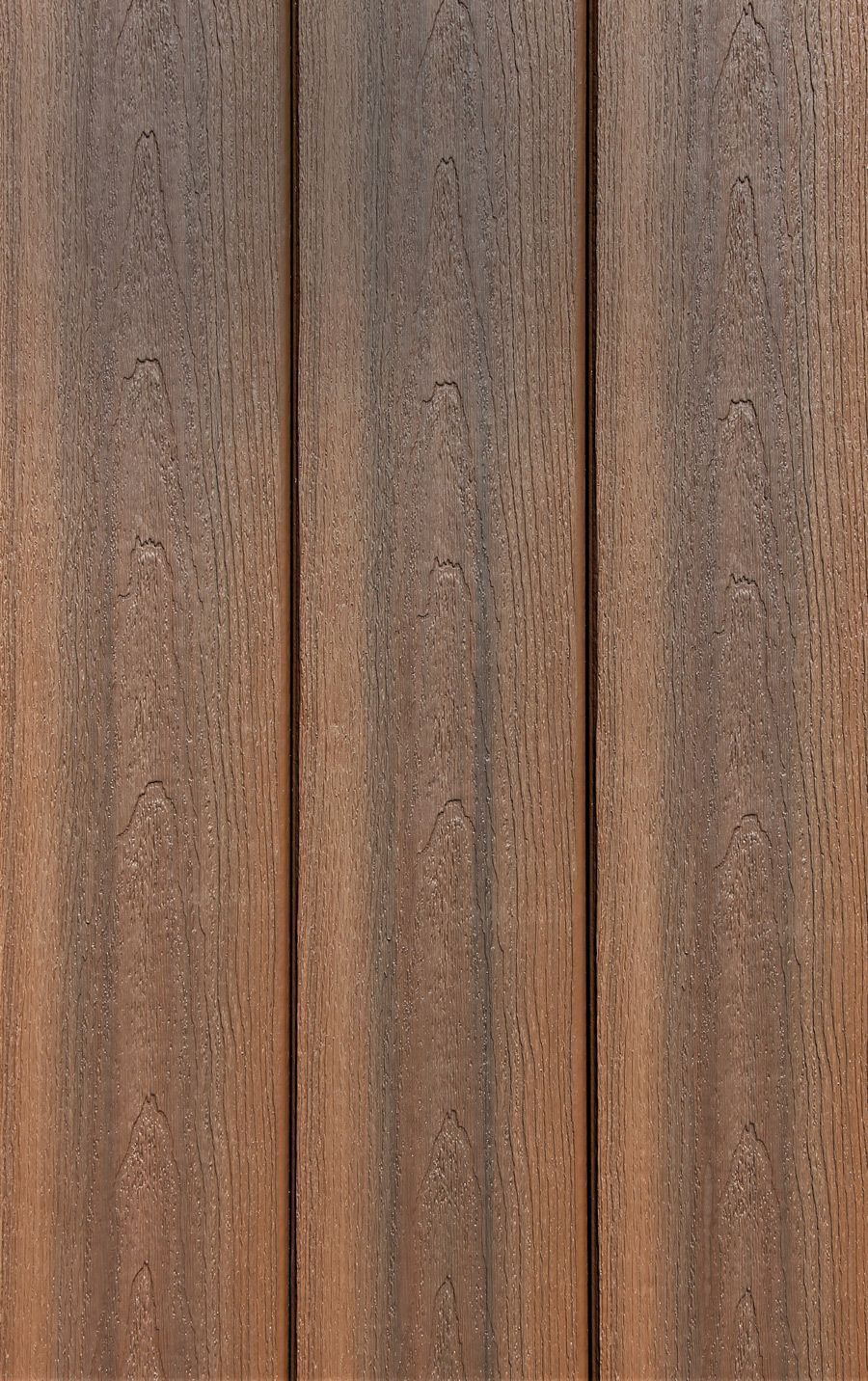 A close up of a piece of wood with a grainy texture.