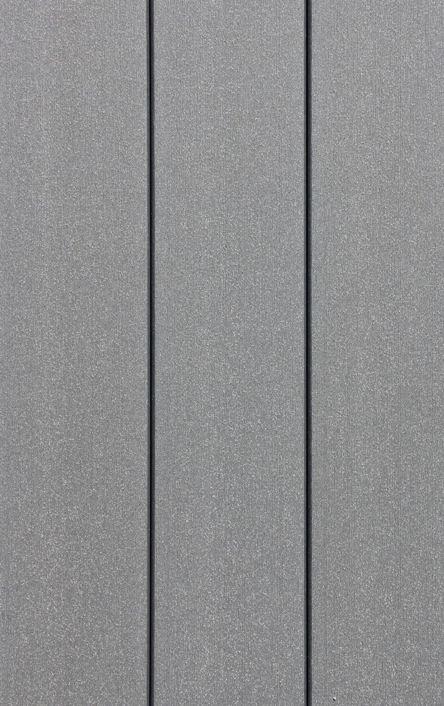 A close up of a gray concrete wall with three lines.