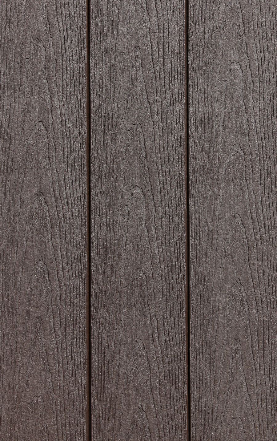 A close up of a brown wooden surface with a grainy texture.