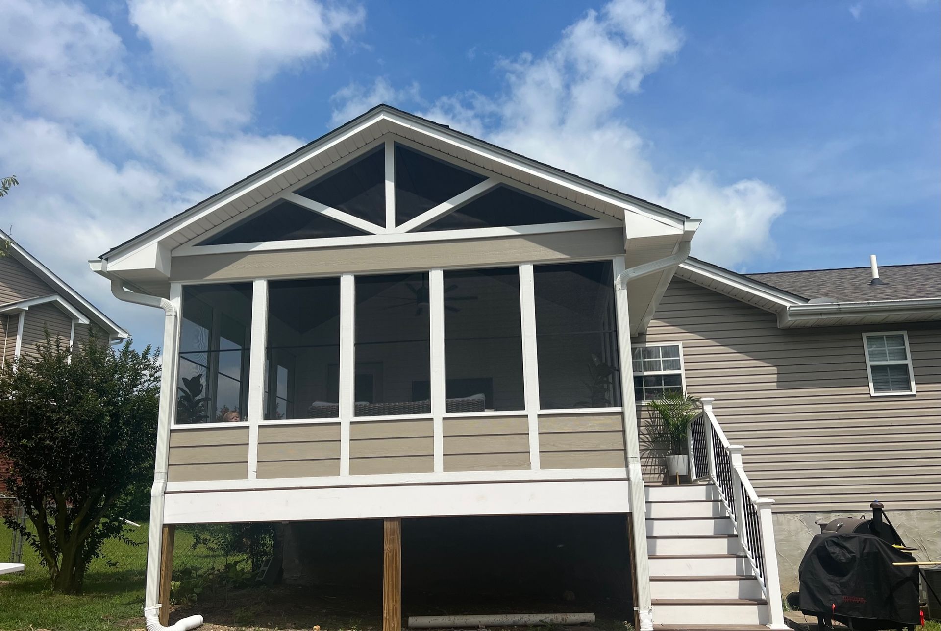screened porch with white trim