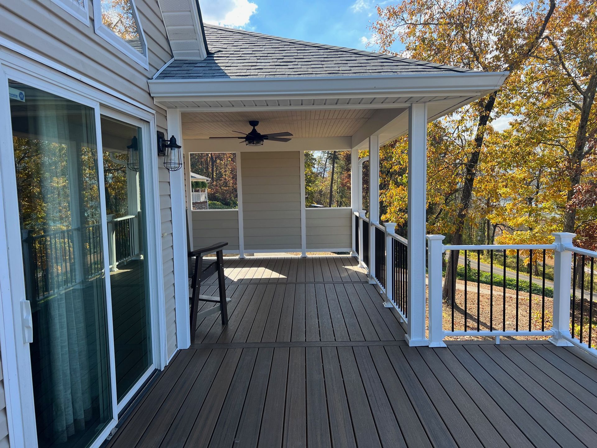 A large deck and sliding glass doors