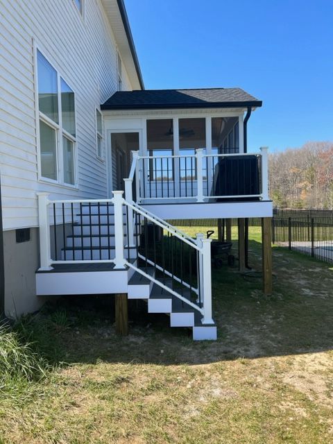 stairs and railing to the screened patio