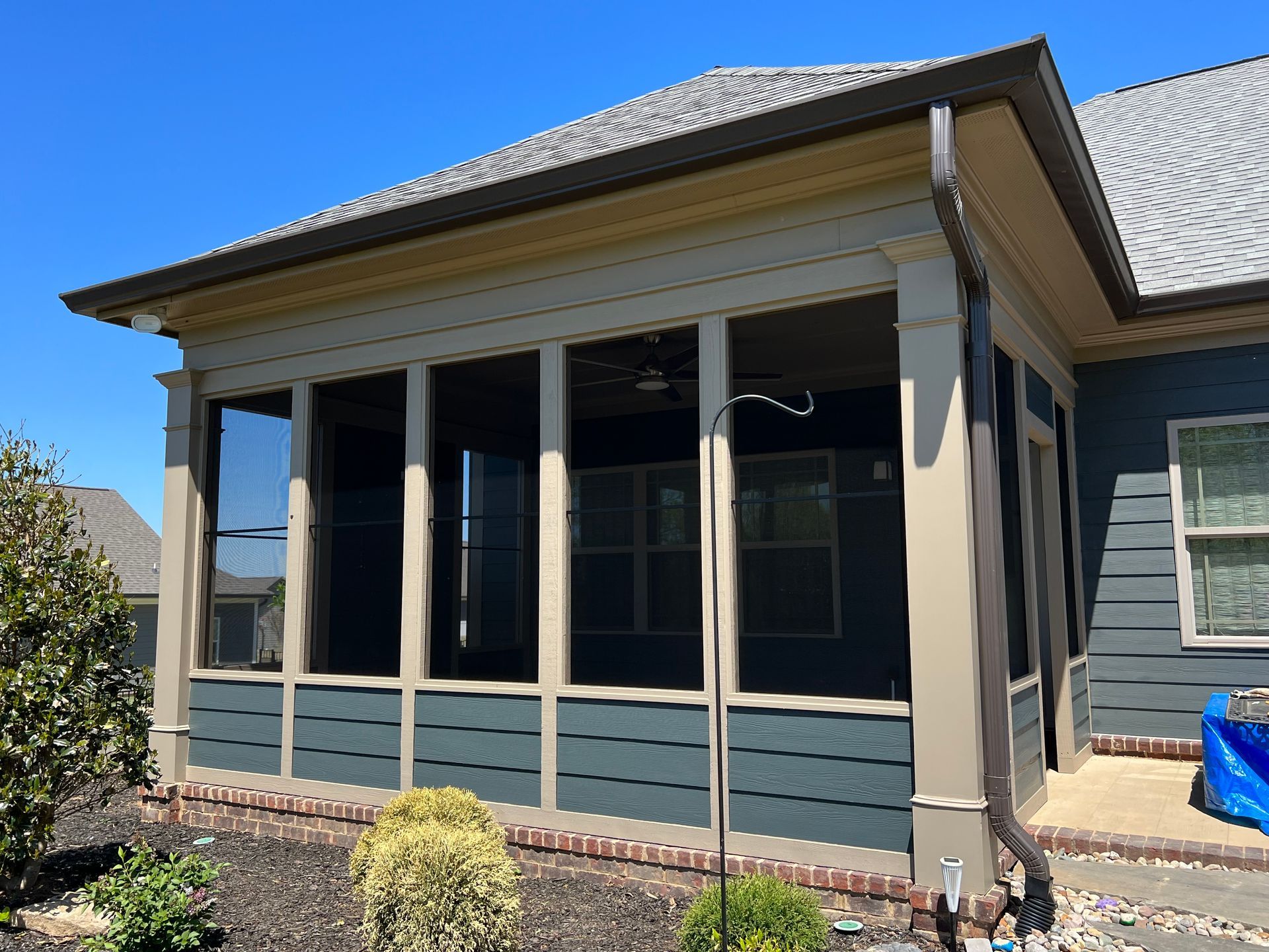 screened room with multiple windows