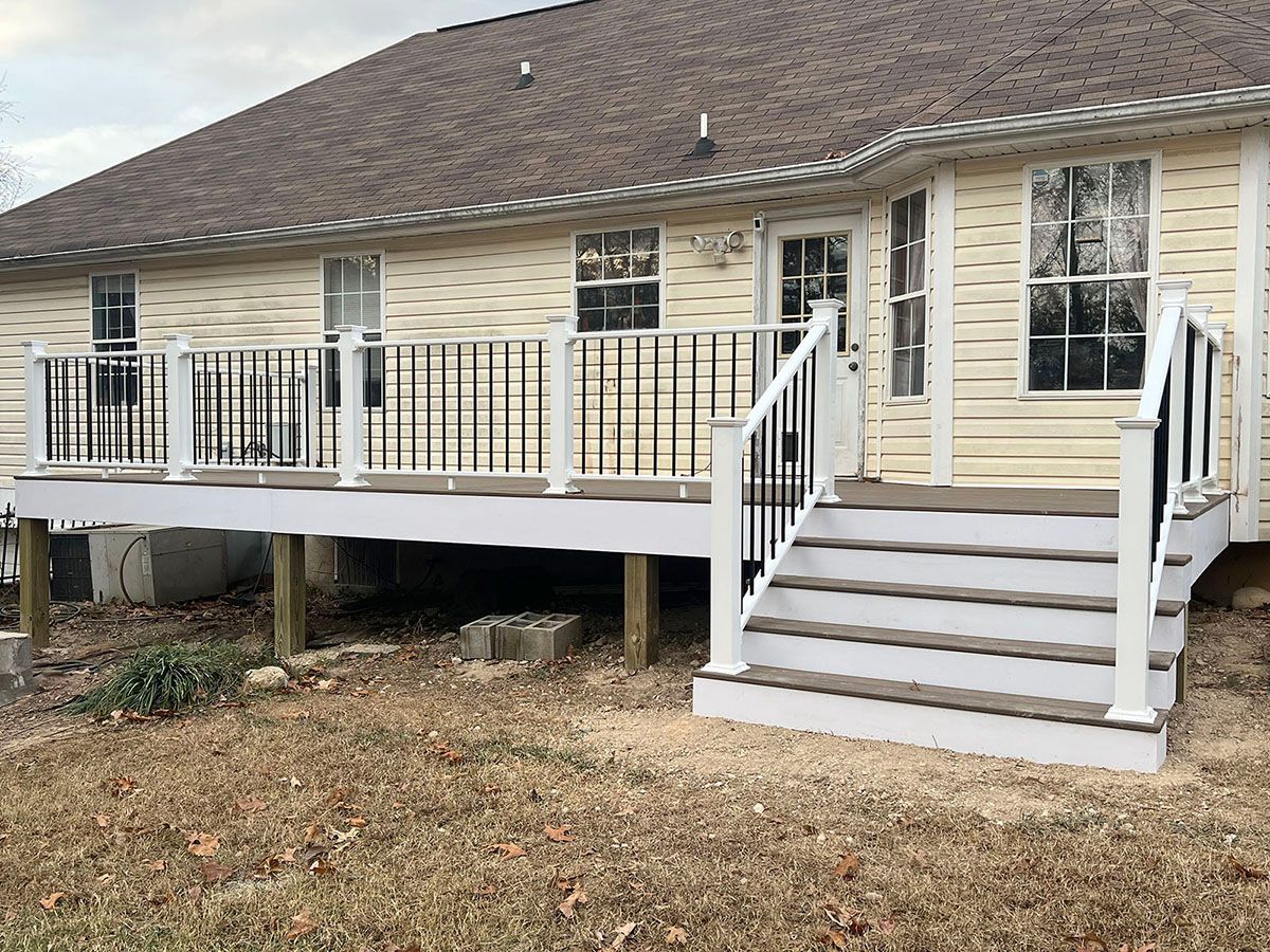 A house with a deck and stairs